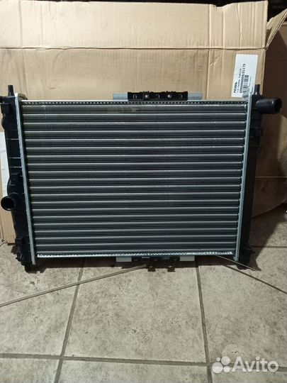 Радиатор охлаждения на renault logan 1