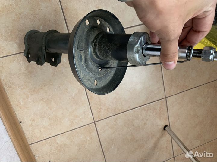 Амортизатор на Opel Astra G