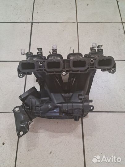 Впускной выпускной коллектор Mitsubishi Lancer X