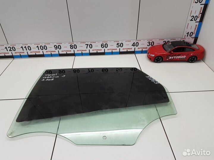 Стекло заднее левое (Opel Astra)