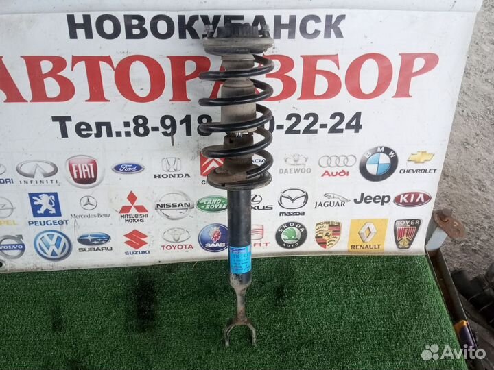 Стойка амортизатора передняя Volkswagen Passat B5