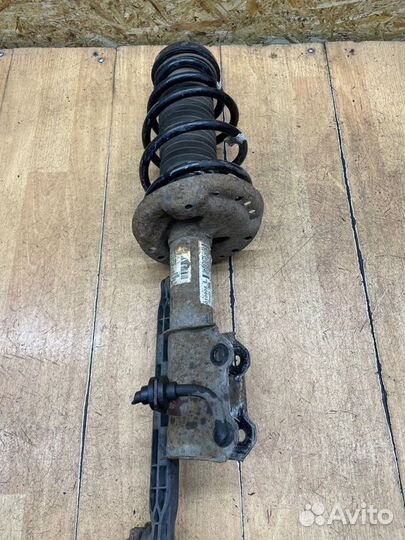 Стойка подвески передняя левая Opel Astra J A16XER