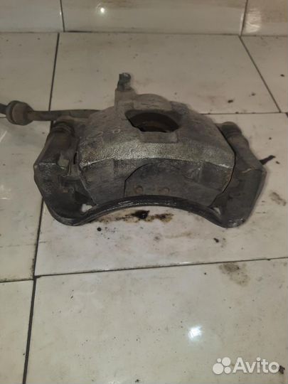 Суппорт передний правый Chevrolet Aveo (T250) 2005