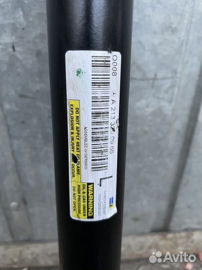 Стойка амортизатора передняя левая Mercedes W213