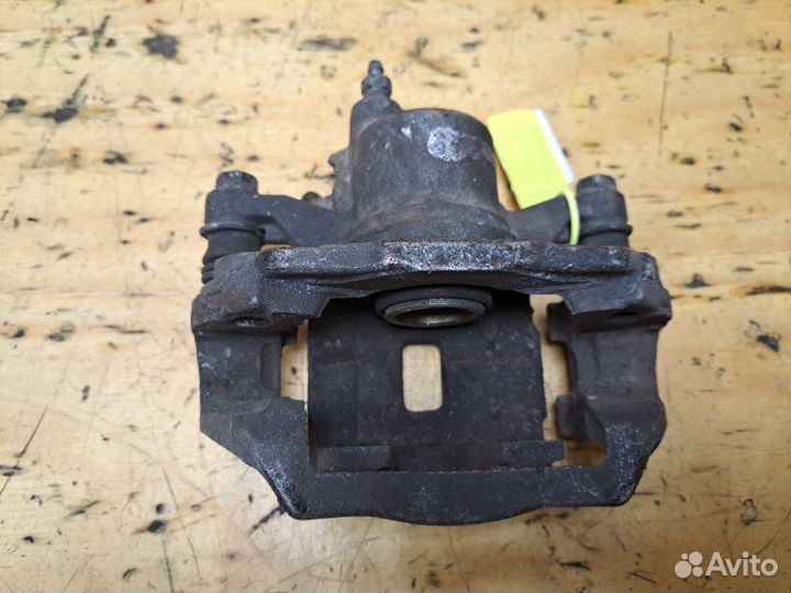 Суппорт задний левый Nissan Laurel HC35 RB20DE