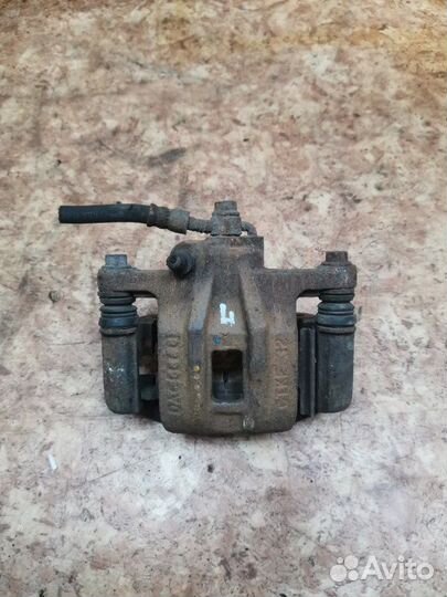 Суппорт тормозной задний левый Chevrolet Lacetti