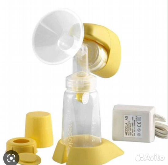 Молокоотсос medela электрический