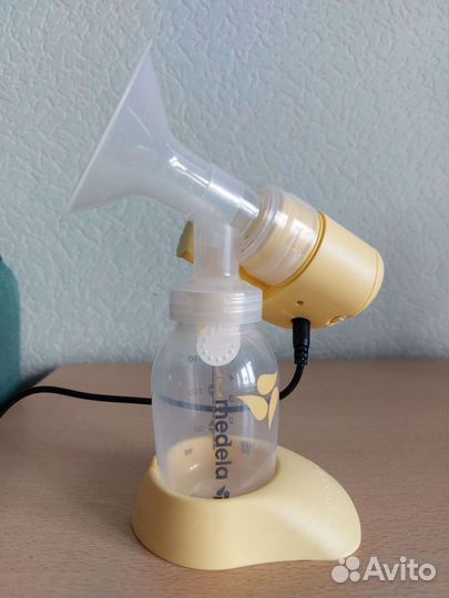 Молокоотсос medela электрический
