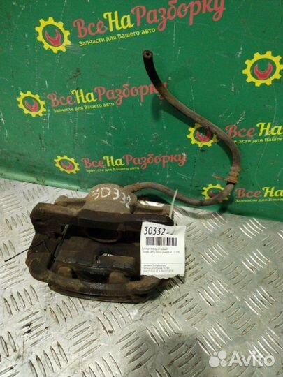 Суппорт передний правый Toyota Camry Gracia