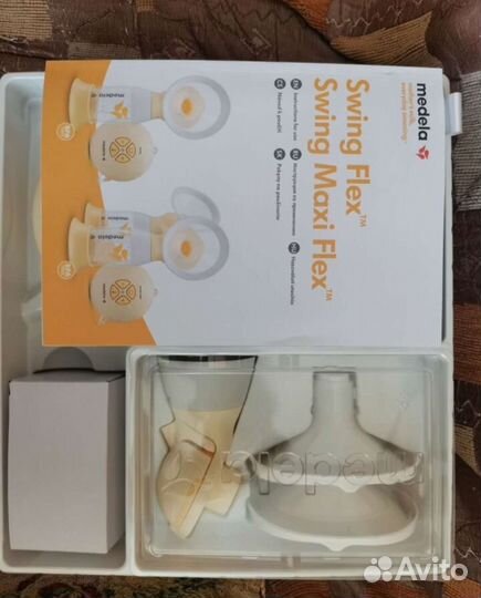 Молокоотсос medela электрический