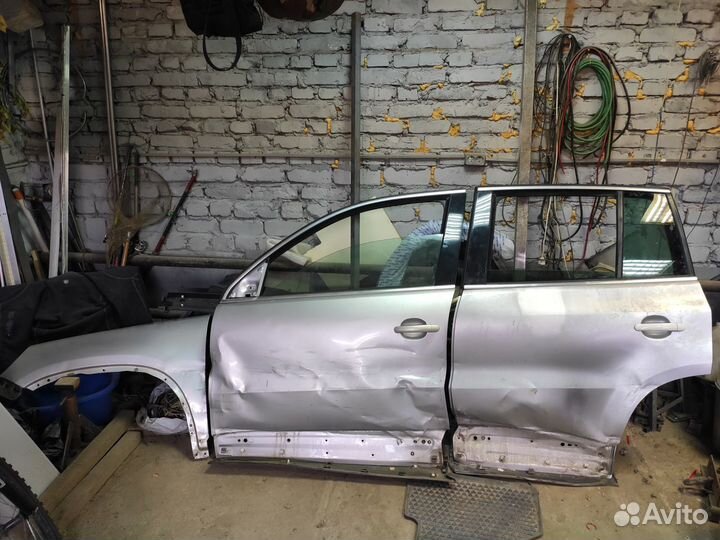 Тигуан 1 левая дверь