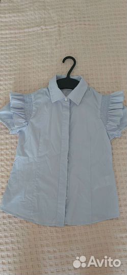 Продам блузку для девочки 128