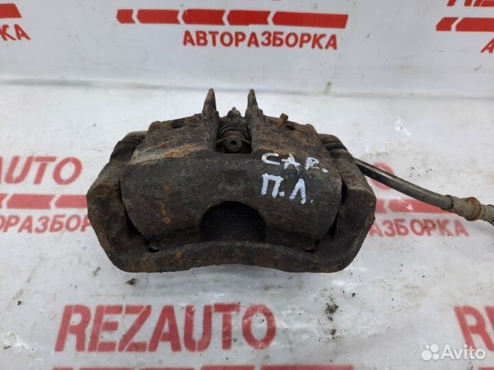 Суппорт тормозной передний левый Mitsubishi