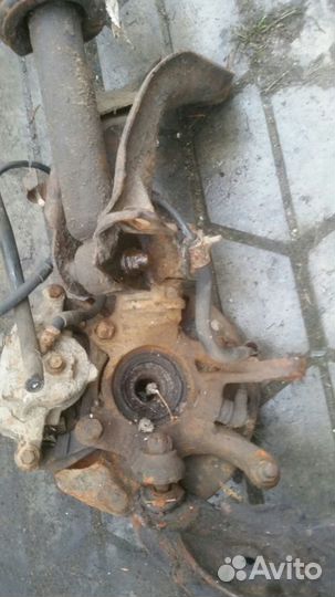 Кулак поворотный Nissan Primera P10-P11