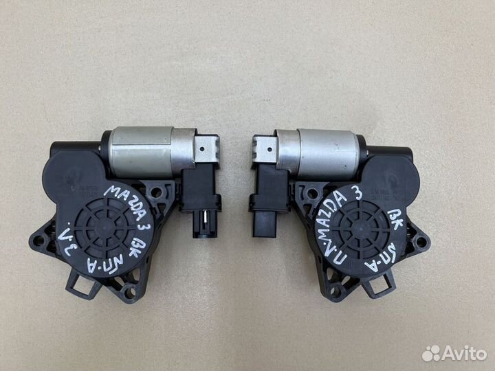 Моторчик стеклоподъемника Mazda 3 BK