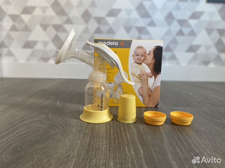 Молокоотсос medela + полный комплект всего нужного