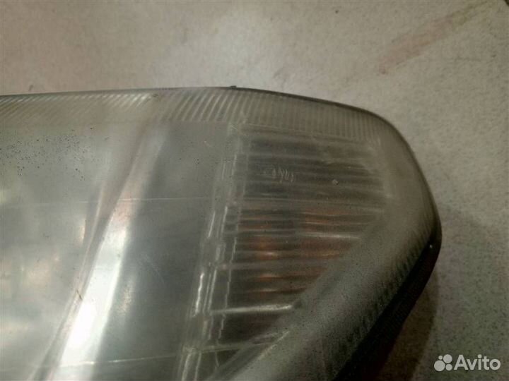 Фара левая Mitsubishi Pajero iO 1998-2007