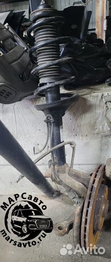 Стойка амортизатора переднего левого/правого Golf4