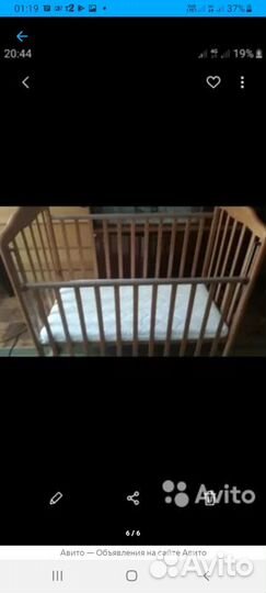 Детская кроватка с маятником