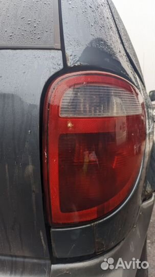 Фонарь задний Додж Караван 4