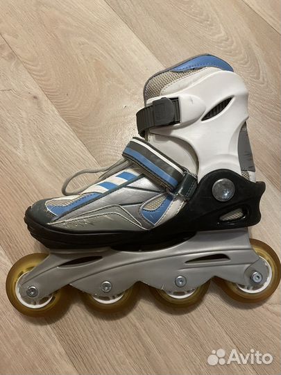 Роликовые коньки