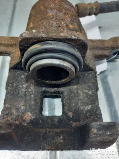 Суппорт тормозной задний правый Hyundai Tucson 1