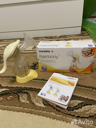 Молокоотсос ручной medela