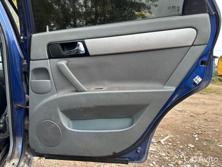 Обшивка двери Chevrolet Lacetti седан 1.4 F14D3