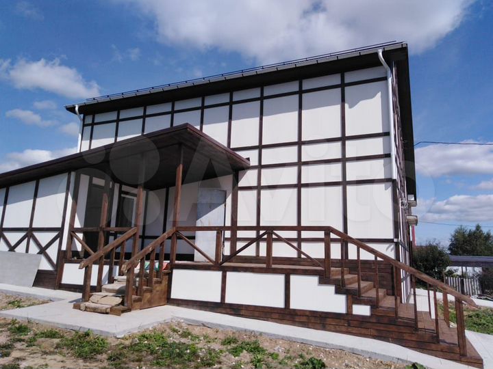 Коттедж 240 м² на участке 12 сот.