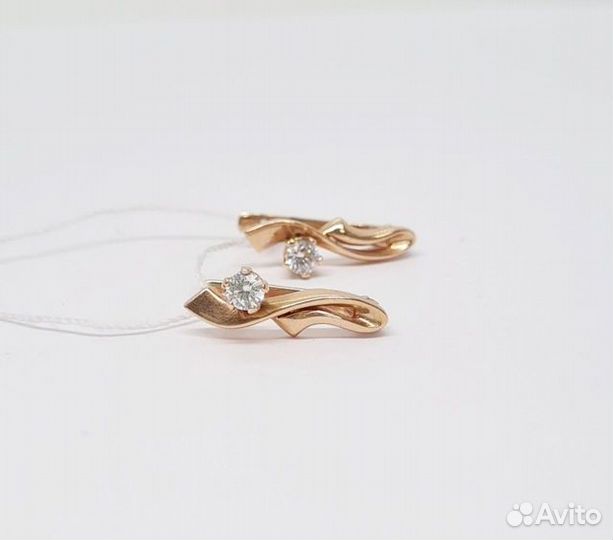 Золотые серьги с камнем