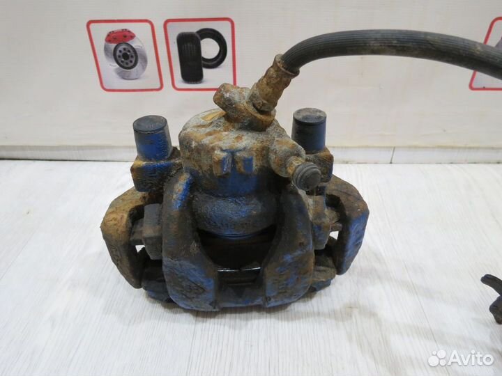 Суппорт тормозной передний левый Renault Sandero 2