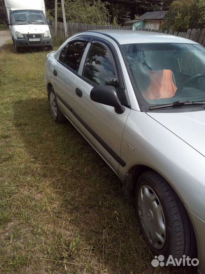 Mitsubishi Carisma 1.3 МТ, 2003, 3 800 км