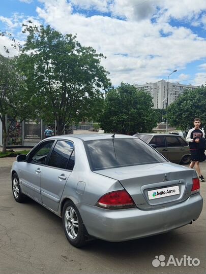 Mitsubishi Lancer 1.6 AT, 2005, 310 000 км