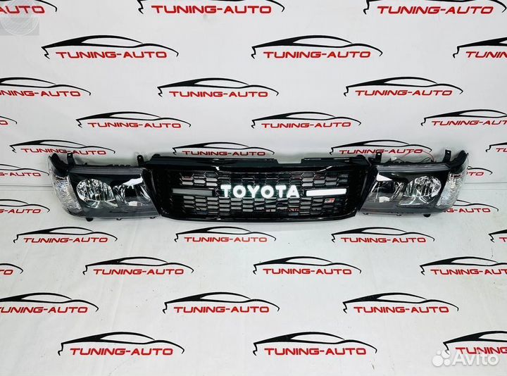 Фары (темные) с решеткой Toyota Land Cruiser 100
