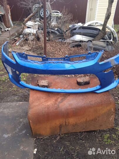 Передний бампер рио4