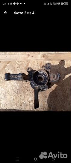 Поворотный кулак левый Ниссан Альмера 1.8 116л.с