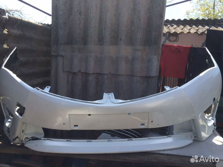 Бампер Toyota corolla 180