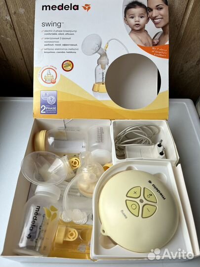 Молокоотсос medela swing электрический