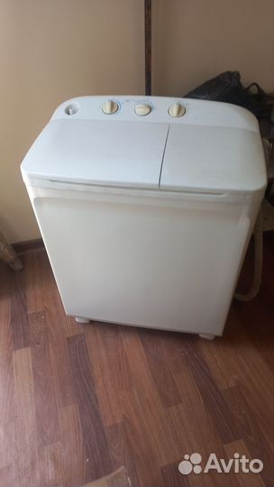 Стиральная машина с вертикальной загрузкой