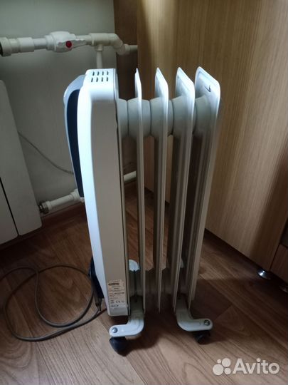Масляный обогреватель delonghi