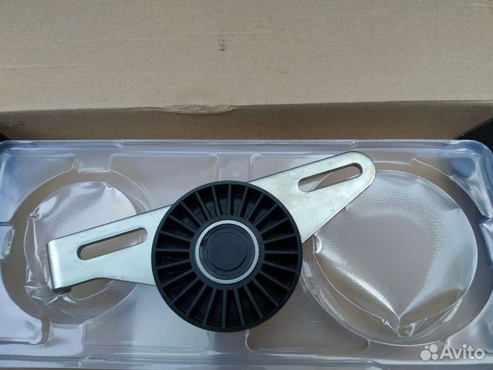 Натяжной ролик