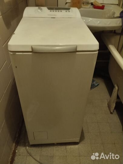 Стиральная машина с вертикальной загрузкой