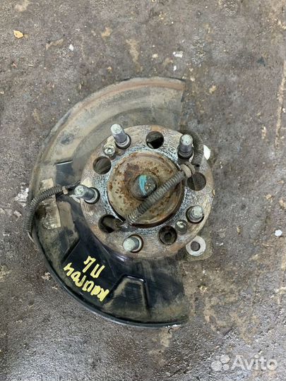 Кулак поворотный левый Ssang Yong Kyron