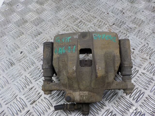 Суппорт тормозной передний правый Suzuki Grand Vit