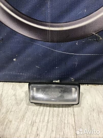 Подсветка номера фонарь Nissan almera G15 Лев