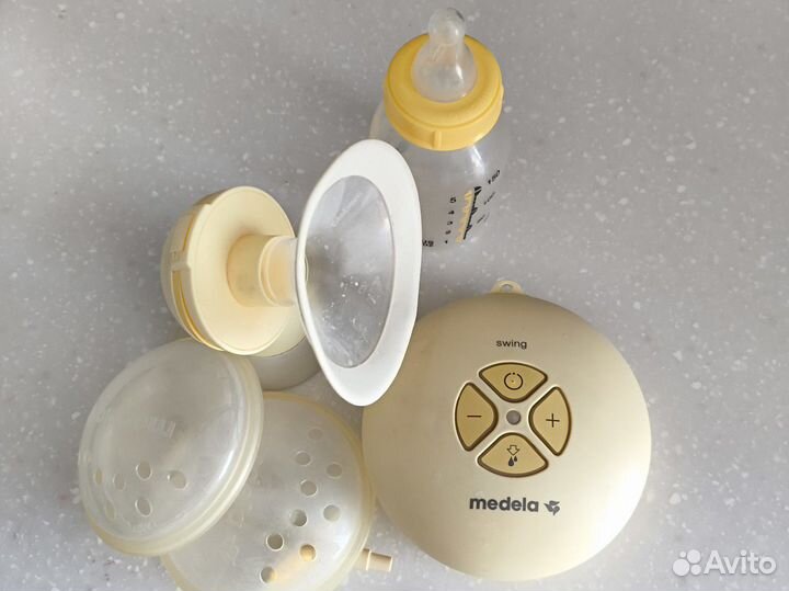 Молокоотсос medela электрический
