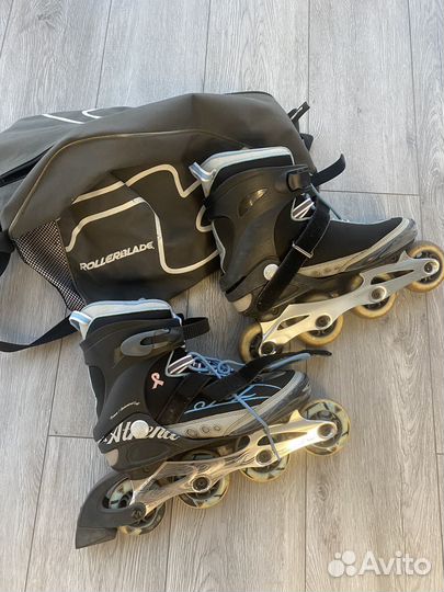 Роликовые коньки