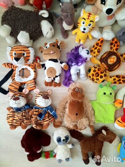Много мягких игрушек