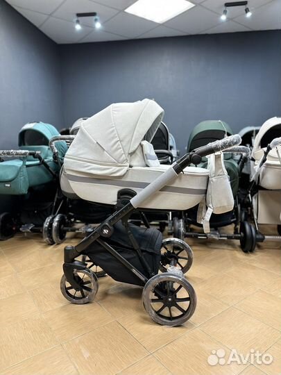 Riko Delta коляска с рождения