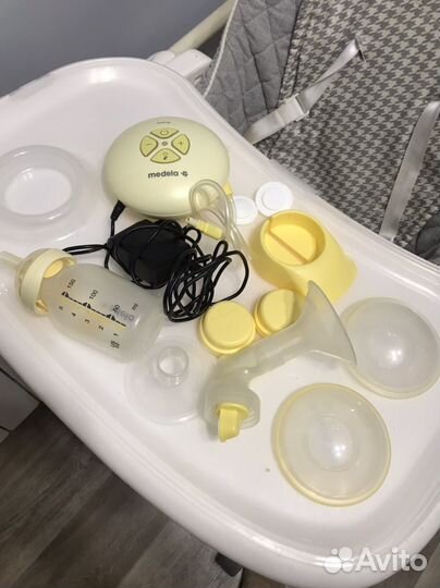 Молокоотсос medela электрический